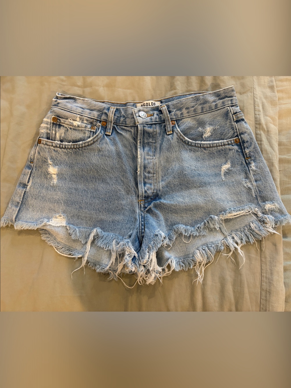 AGOLDE Faded Light Blue Distressed Denim Shorts